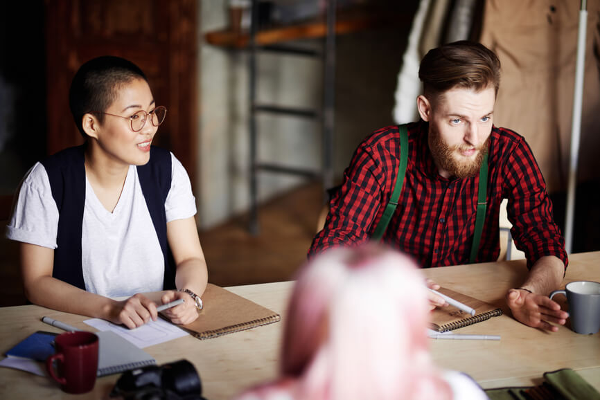 young-employees-speaking-in-meeting-intellectual-capital